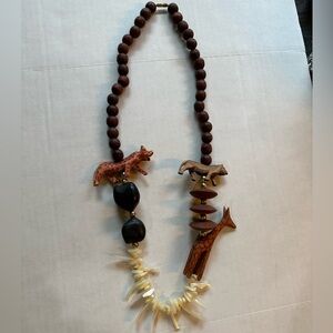 Vintage tribal hand carved giraffe cheetah groans mother of pearl 26”